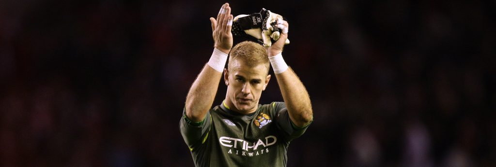 Manchester City's goalkeeper Joe Hart applauds supporters after his team's 1-1 draw against Liverpool in their English Premier League soccer match at Anfield Stadium, Liverpool, England, Sunday, Nov. 27, 2011. (AP Photo/Jon Super)